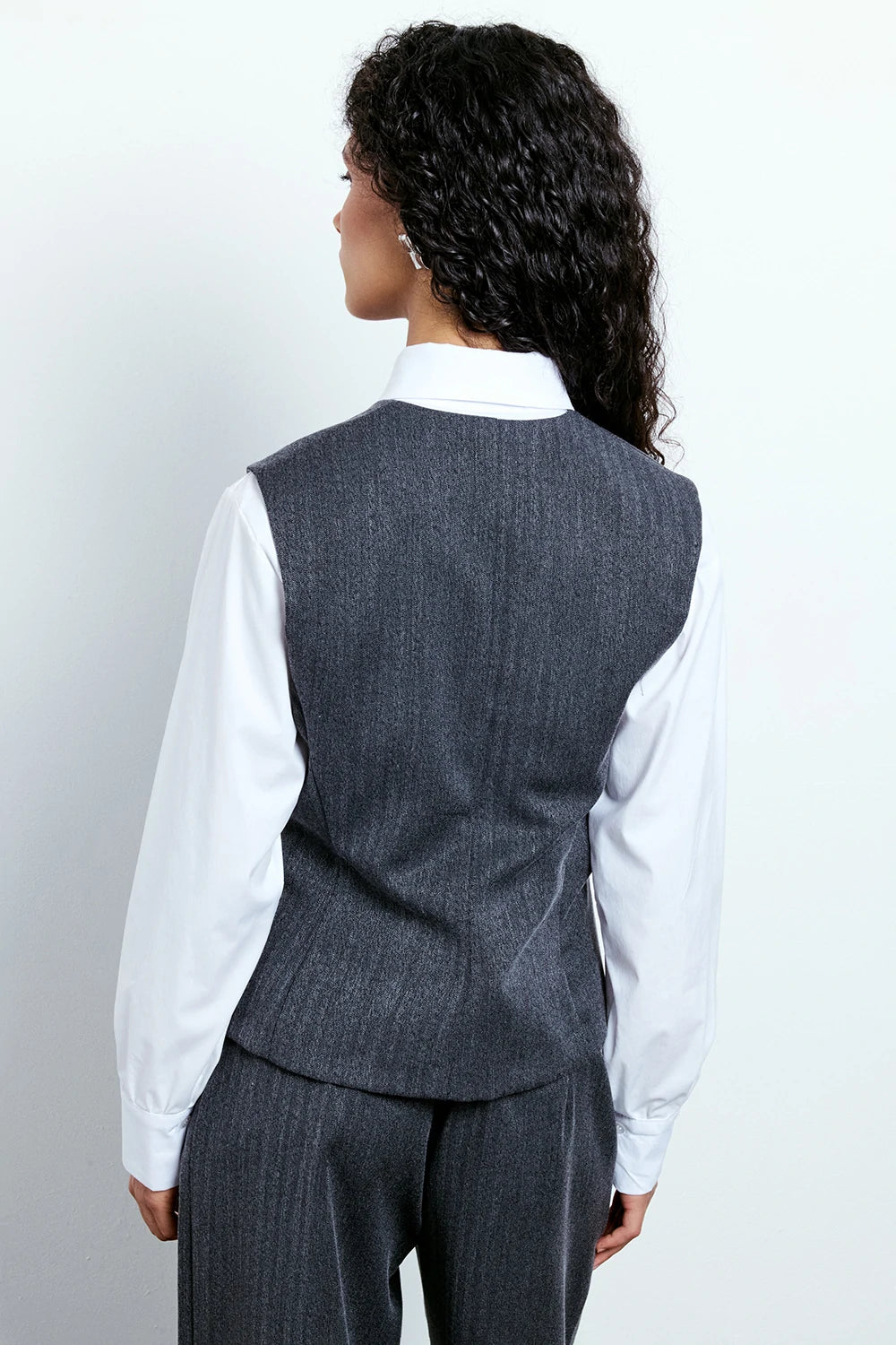 GILET ASIMMETRICO
