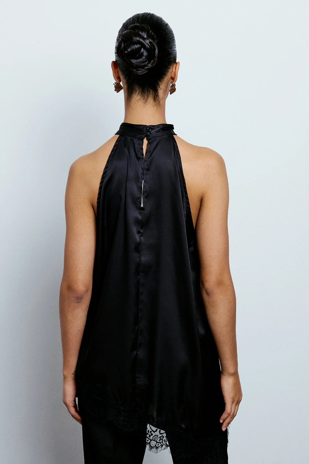 TOP HALTER ASIMMETRICO CON PIZZO NERO