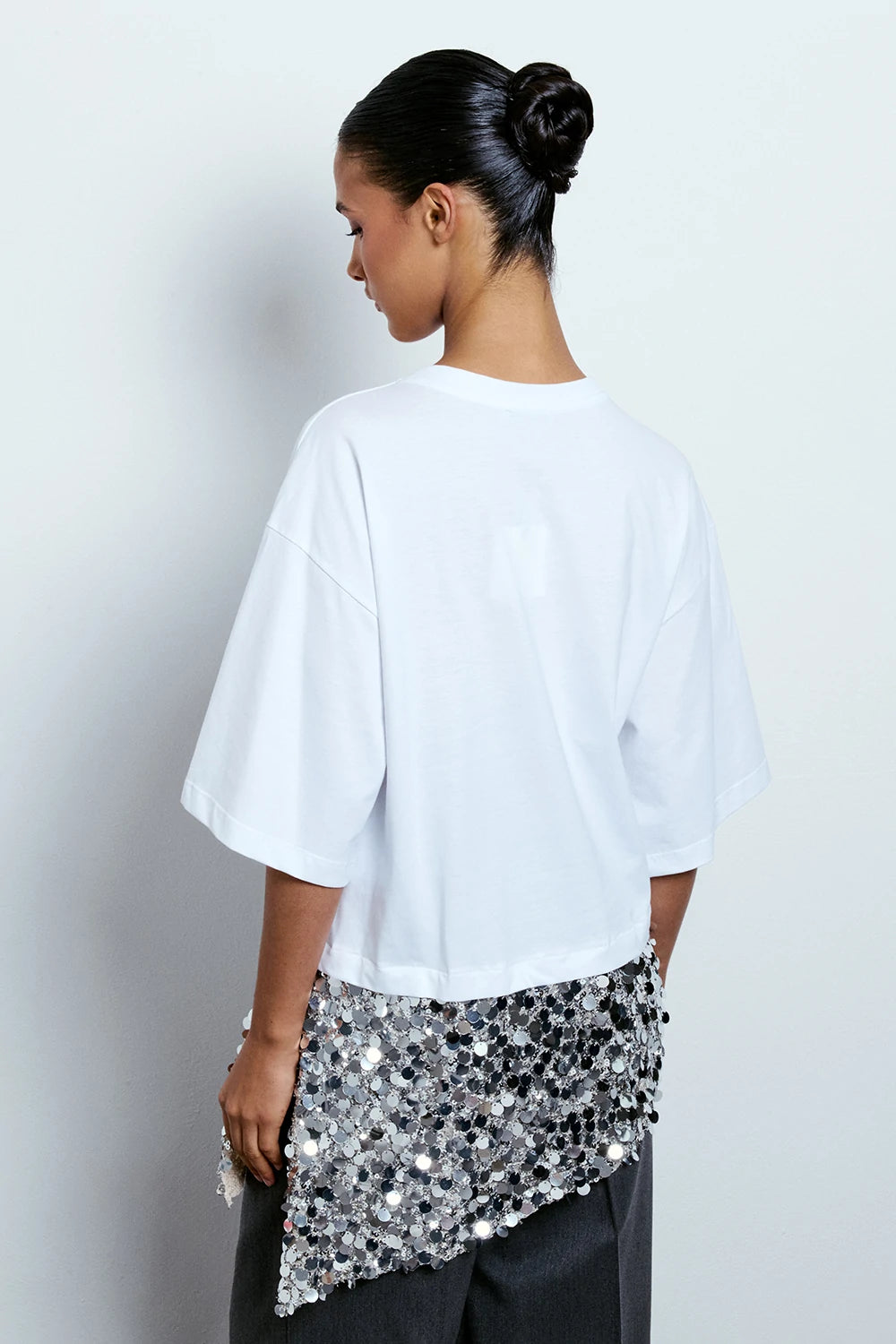 T-SHIRT ASIMMETRICA CON PAILLETTES