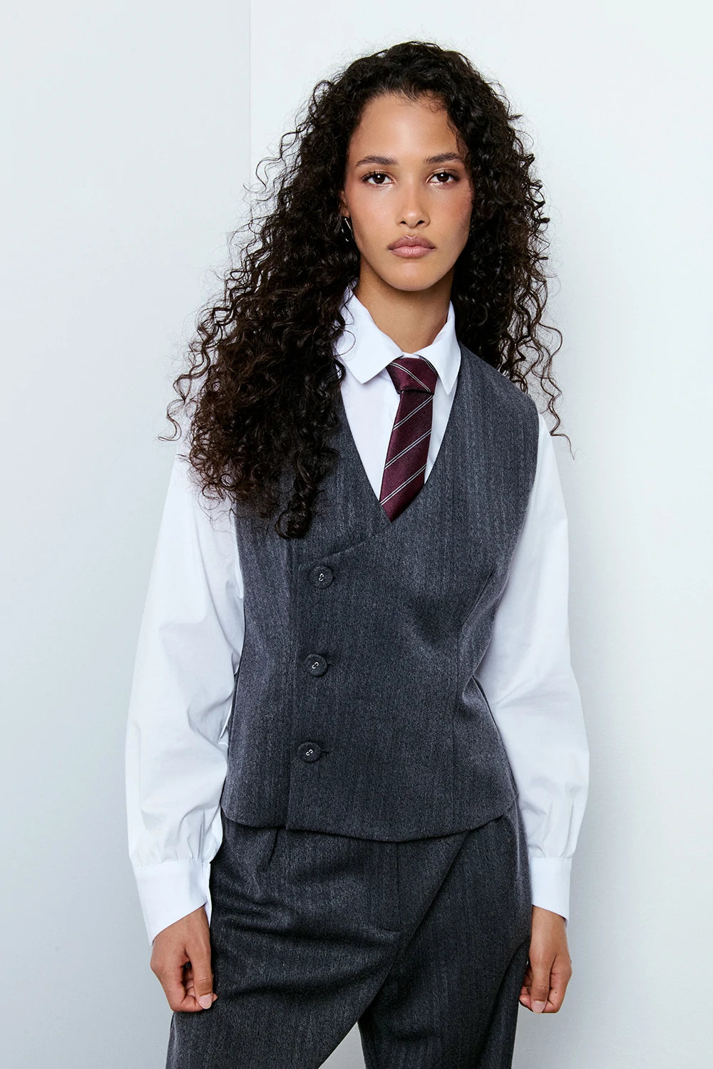 GILET ASIMMETRICO